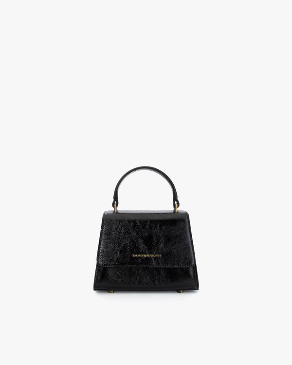 ALEXIA NANO bag in black naplak, front view, standing, with gathered handle