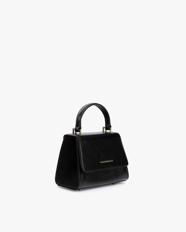 ALEXIA NANO bag in black naplak, three-quarter view, standing, top handle