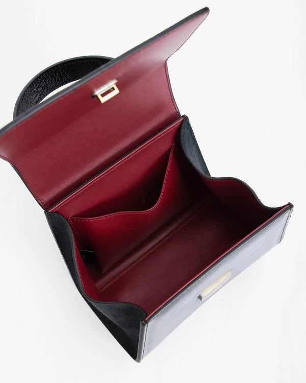 ALEXIA NANO black bag open, inside view of flap and burgundy red lining pocket
