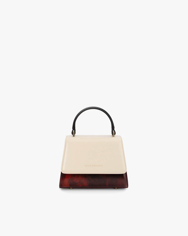 ALEXIA NANO bag in Colourblock art déco, front view, black handle, cream flap and tortoiseshell-effect base