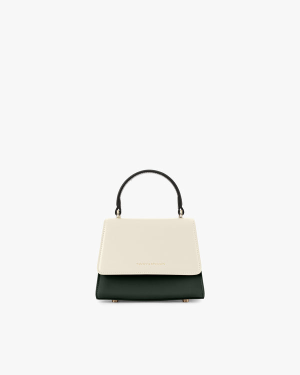 ALEXIA NANO bag in Colourblock Canopé, front view, cream flap and dark green body, rigid black handle