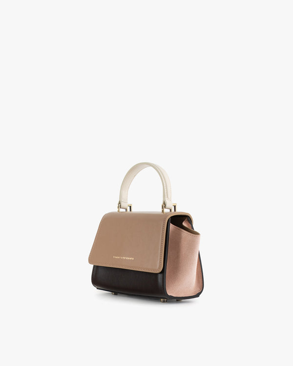 ALEXIA NANO bag in Colourblock Marlowe, angled view, flap closed, side wings extended, rigid top handle