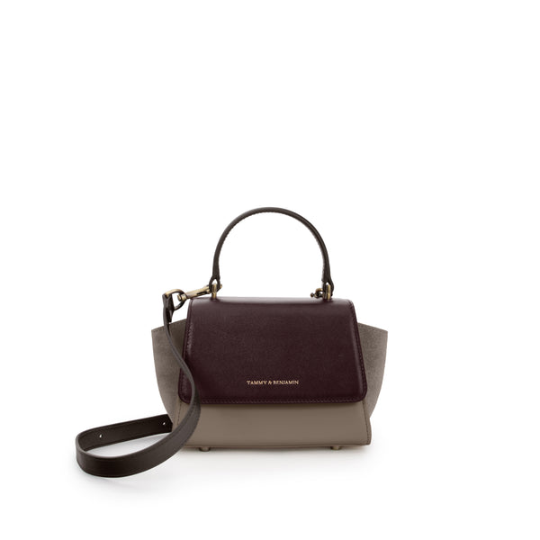 ALEXIA NANO bag in Colourblock Stratum, front view, standing, flap closed, with top handle and removable strap