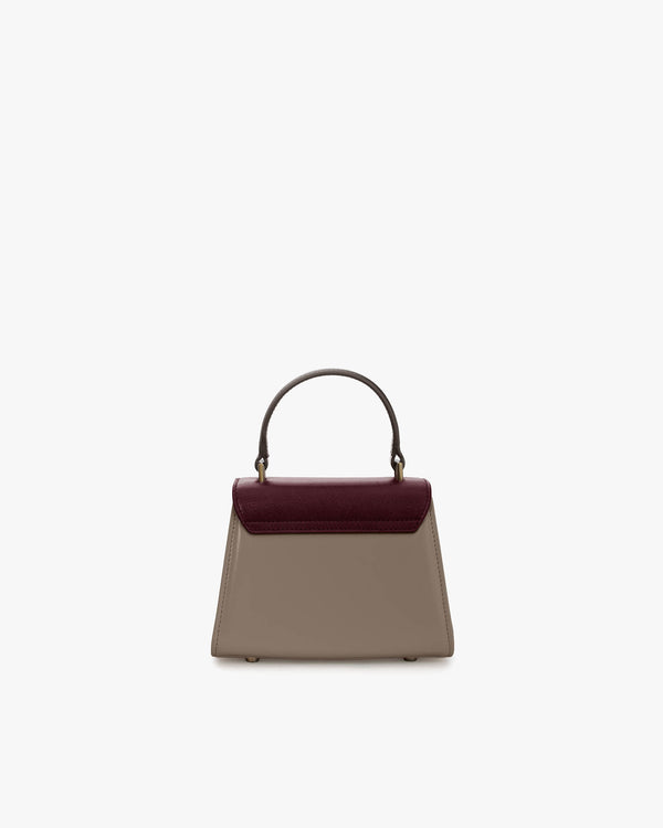 ALEXIA NANO bag in Colourblock Stratum, front view, top handle, burgundy flap and taupe body