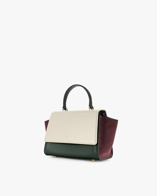 ALEXIA bag in Colourblock Canopé, three-quarter view, wings tucked in, top handle shown