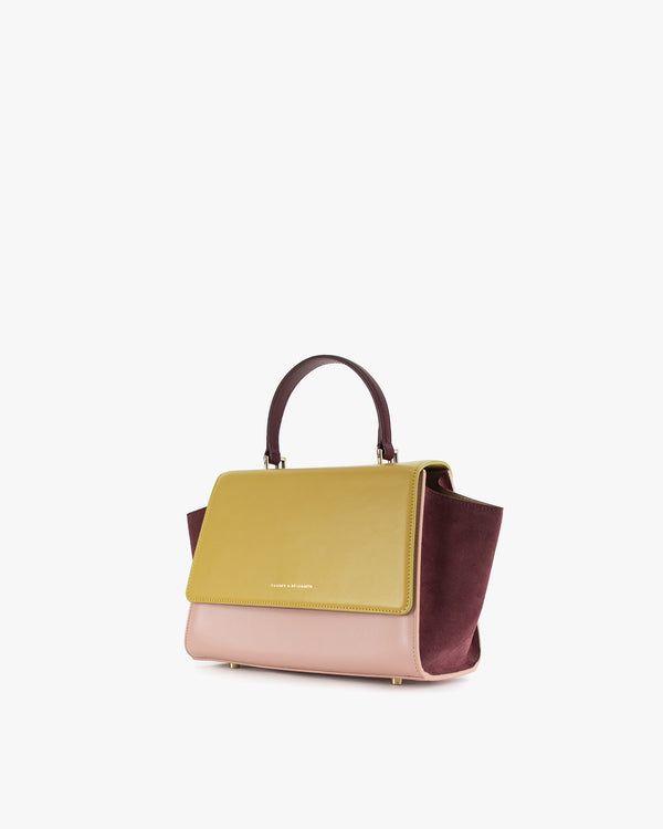 ALEXIA bag in Colourblock Vesper, three-quarter back view, side wing expanded, held by top handle