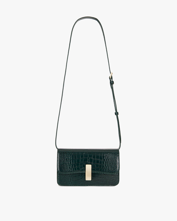 BLAKE bag in green croc-embossed leather, front view, laid flat, thin adjustable strap extended