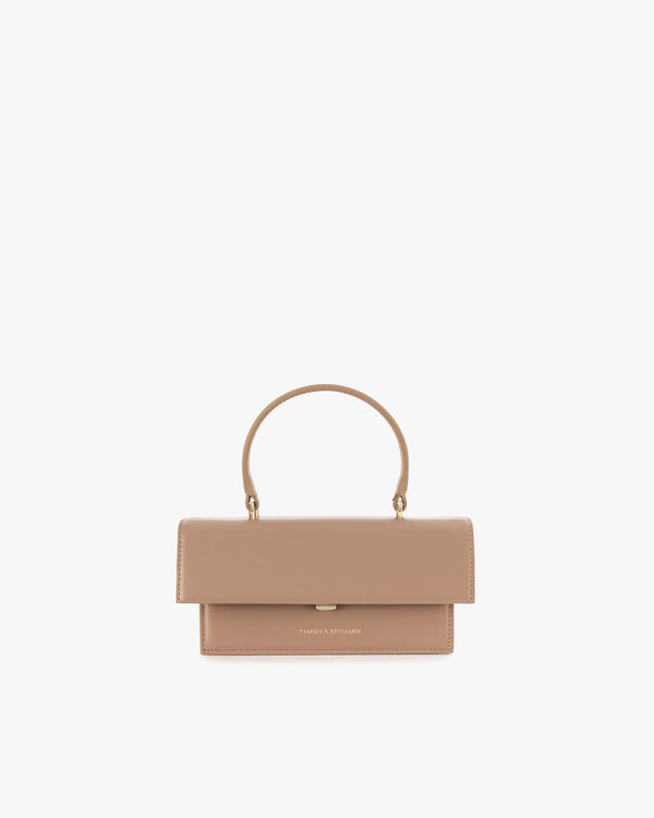THEA MINI bag in beige, front view, standing, flap closed with top handle raised