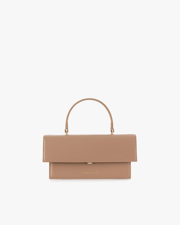 THEA bag in beige, front view, flap closed, top handle, white background