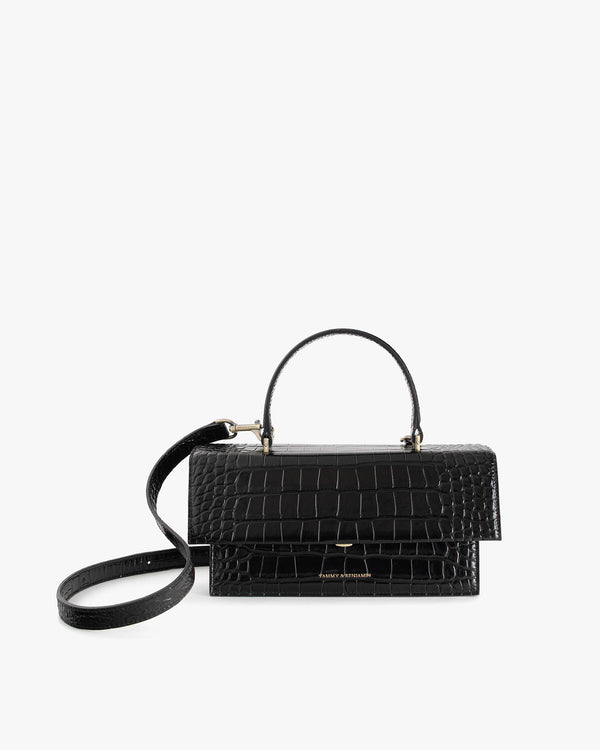 THEA bag in Black - Embossed Crocodile, front view, top handle with detached crossbody strap