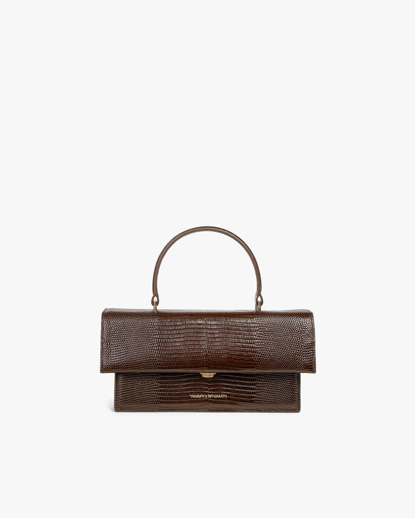 THEA bag in brown embossed lizard leather, front view, standing, with top handle and gold clasp