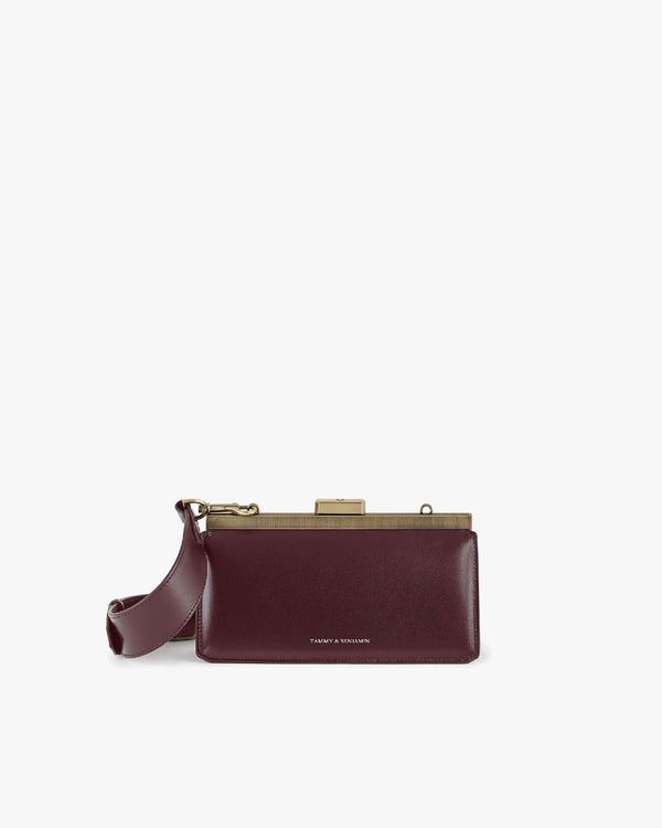 JEANNE BAGUETTE bag in Mahogany, front view, retro gold clasp, shown with shoulder strap