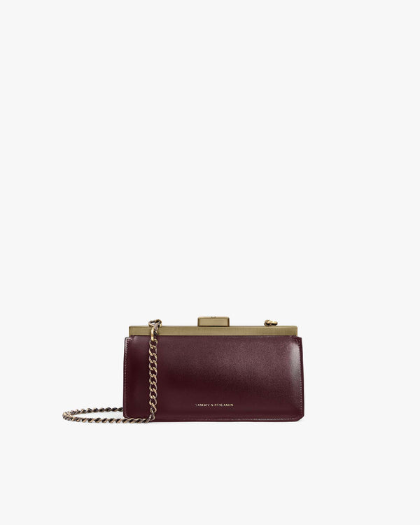 JEANNE BAGUETTE bag in Mahogany, front view with gold retro clasp and removable chain